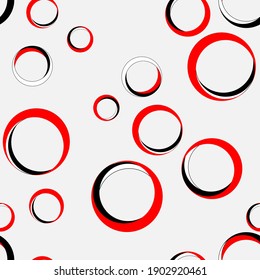 seamless abstract pattern of circles made in red, black and white colors