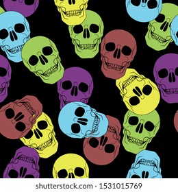 Seamless abstract pattern with colorful human skulls.