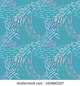 Seamless abstract pattern with colorful lines. Hand drawn dashed lines forming overlapping waves. Stylish texture with stitches. Modern geometric background from bold dotted lines for textile, fabric.