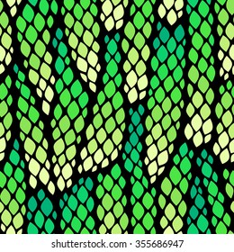 Seamless abstract pattern with colorful rhombuses. Vector illustration with leaves. Snake skin texture.