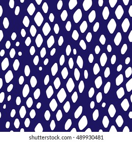 Seamless abstract pattern with colorful rhombuses. Vector illustration with leaves. Reptiles skin texture.
