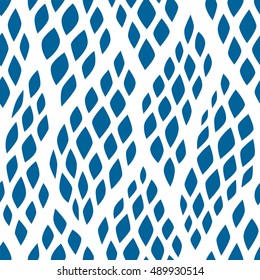 Seamless abstract pattern with colorful rhombuses. Vector illustration with leaves. Reptiles skin texture.