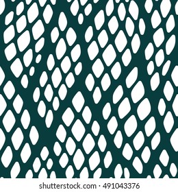 Seamless abstract pattern with colorful rhombuses. Vector illustration with leaves. Reptiles skin texture.