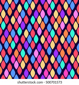 Seamless abstract pattern with colorful rhombuses. Vector illustration with leaves. Reptiles skin texture.
