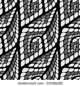 Seamless abstract pattern with colorful rhombuses. Vector illustration with leaves. Reptiles skin texture.