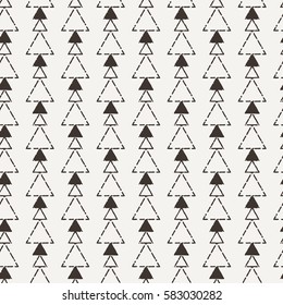 The seamless abstract pattern. Creative monochrome triangle background.
