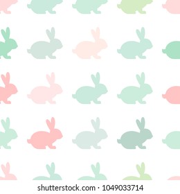 Seamless abstract pattern with Easter rabbits of different pastel colors. White background. Decorative holiday wallpaper, good for printing. Cute Vector illustration. Flat design