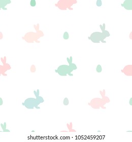 Seamless abstract pattern with Easter rabbits and eggs of different pastel colors. White background. Decorative holiday wallpaper, good for printing. Cute Vector illustration. Flat design