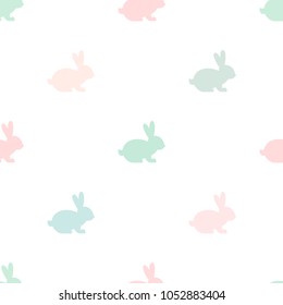 Seamless abstract pattern with Easter rabbits of different pastel colors. White background. Decorative holiday wallpaper, good for printing. Cute Vector illustration. Flat design