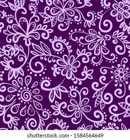 Seamless abstract pattern in ethnic style. The background is densely painted with simple and naive flowers and curls. A bright print for textiles and paper in lilac colors. Vector illustration.