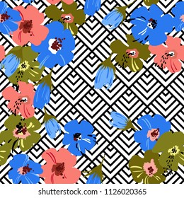 Seamless abstract pattern with floral elements. Image of exotic tropical flowers on a geometric background. Imitation of the painting by watercolor. Summer motives. Vector illustration