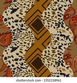 Seamless abstract pattern with flowers, leaves and animal skins.