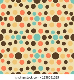 Seamless abstract pattern with geometric pattern of multicolored circles.
