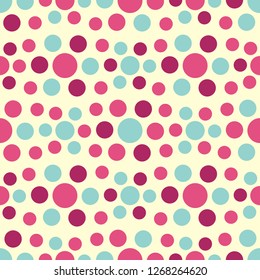 Seamless abstract pattern with geometric pattern of multicolored circles.
