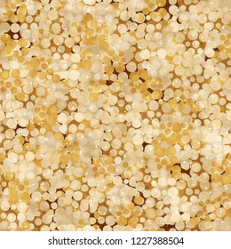 Seamless abstract pattern. Golden texture with sparks.