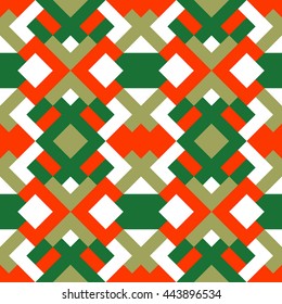 Seamless abstract pattern in green, red and white colors. Vector background of triangles. Mosaic texture for wrapping paper, textile, wallpaper design