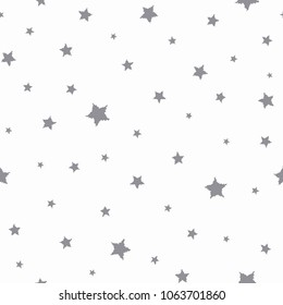 Seamless abstract pattern with grey  shabby stars of different size on white background. Vector illustration black and white.