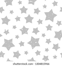 Seamless abstract pattern with grey stars of different rotation and size. Grunge star silver background. Vector illustration. Cosmos texture with particles of debris. Retro, faded, grunge texture