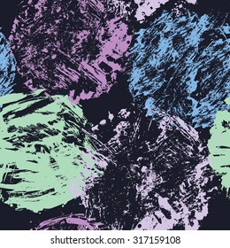 Seamless abstract pattern with grunge colorful circles on black background.