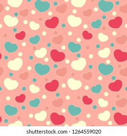 Seamless abstract pattern of hearts and circles.

