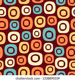 Seamless abstract pattern with the image of oval geometric shapes
