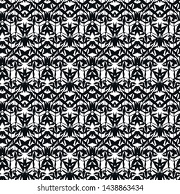 Seamless abstract pattern. Imitation lace. Black lace on white background.Black and white graphics. For design and decoration of fabric, paper, Wallpaper and packaging.Grid pattern.
