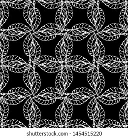 Seamless abstract pattern. Imitation lace. White lace on black background. Black and white graphics. For design and decoration of fabric, paper, Wallpaper and packaging.Mesh pattern.