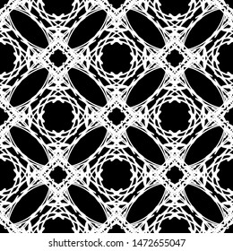 Seamless abstract pattern. Imitation lace. White lace on black background. Black and white graphics. For design and decoration of fabric, paper, Wallpaper and packaging.Mesh pattern.