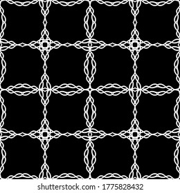 Seamless abstract pattern. Imitation lace. White lace on black background. Black and white graphics. For design and decoration of fabric, paper, Wallpaper and packaging.Mesh pattern. 