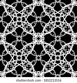 Seamless abstract pattern. Imitation lace. White lace on black background. Black and white graphics. For design and decoration of fabric, paper, Wallpaper and packaging.Mesh pattern.
