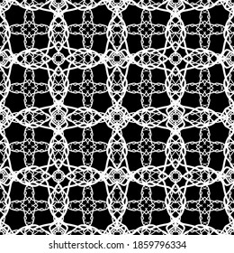 Seamless abstract pattern. Imitation lace. White lace on black background. Black and white graphics. For design and decoration of fabric, paper, Wallpaper and packaging.Mesh pattern.