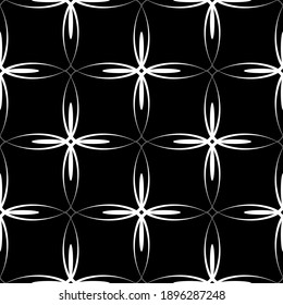 Seamless abstract pattern. Imitation lace. White lace on black background. Black and white graphics. For design and decoration of fabric, paper, Wallpaper and packaging.Mesh pattern.