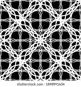 Seamless abstract pattern. Imitation lace. White lace on black background. Black and white graphics. For design and decoration of fabric, paper, Wallpaper and packaging.Mesh pattern.