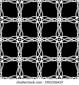 Seamless abstract pattern. Imitation lace. White lace on black background. Black and white graphics. For design and decoration of fabric, paper, Wallpaper and packaging.Mesh pattern.