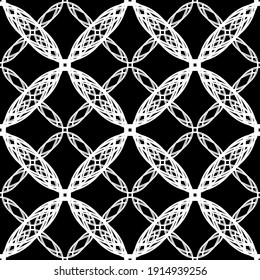 Seamless abstract pattern. Imitation lace. White lace on black background. Black and white graphics. For design and decoration of fabric, paper, Wallpaper and packaging.Mesh pattern.