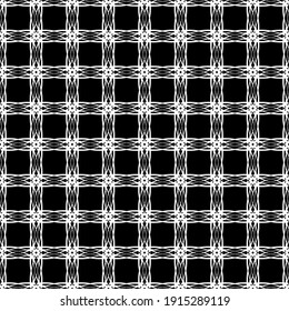 Patrón abstracto sin inconvenientes. Imitación de encaje. Lazo blanco sobre fondo negro. Gráficos en blanco y negro. Para el diseño y la decoración de tela, papel, papel pintado y embalaje.Patrón de malla.