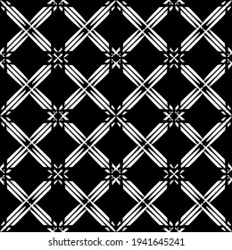 Seamless abstract pattern. Imitation lace. White lace on black background. Black and white graphics. For design and fabric decoration, paper, Wallpaper and packaging .Mesh pattern.