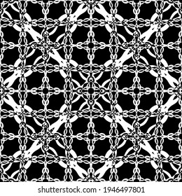 Seamless abstract pattern. Imitation lace. White lace on black background. Black and white graphics. For design and decoration of fabric, paper, Wallpaper and packaging.Mesh pattern.