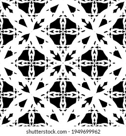 Patrón abstracto sin inconvenientes. Imitación de encaje. Lazo blanco sobre fondo negro. Gráficos en blanco y negro. Para el diseño y la decoración de tela, papel, papel pintado y embalaje.Patrón de malla.