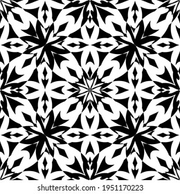 Patrón abstracto sin inconvenientes. Imitación de encaje. Lazo blanco sobre fondo negro. Gráficos en blanco y negro. Para el diseño y la decoración de tela, papel, papel pintado y embalaje.Patrón de malla.