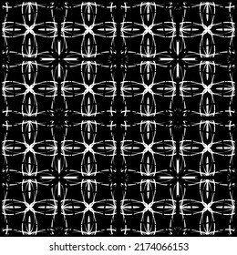 Seamless abstract pattern. Imitation lace. White lace on black background. Black and white graphics. For design and decoration of fabric, paper, Wallpaper and packaging.Mesh pattern.