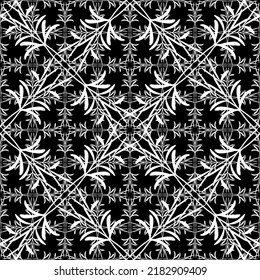 Seamless abstract pattern. Imitation lace. White lace on black background. Black and white graphics. For design and decoration of fabric, paper, Wallpaper and packaging.Mesh pattern.