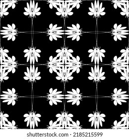 Seamless abstract pattern. Imitation lace. White lace on black background. Black and white graphics. For design and decoration of fabric, paper, Wallpaper and packaging.Mesh pattern.