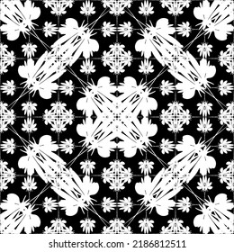 Seamless abstract pattern. Imitation lace. White lace on black background. Black and white graphics. For design and decoration of fabric, paper, Wallpaper and packaging.Mesh pattern.