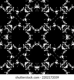Seamless abstract pattern. Imitation lace. White lace on black background. Black and white graphics. For design and decoration of fabric, paper, Wallpaper and packaging.Mesh pattern.
