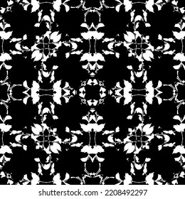 Seamless abstract pattern. Imitation lace. White lace on black background. Black and white graphics. For design and decoration of fabric, paper, Wallpaper and packaging.Mesh pattern.