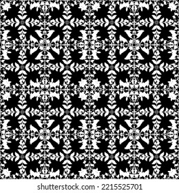 Seamless abstract pattern. Imitation lace. White lace on black background. Mesh pattern.Black and white graphics. For design and decoration of fabric, paper, Wallpaper and packaging.