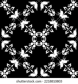 Seamless abstract pattern. Imitation lace. White lace on black background. Mesh pattern.Black and white graphics. For design and decoration of fabric, paper, Wallpaper and packaging.