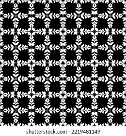Seamless abstract pattern. Imitation lace. White lace on black background. Mesh pattern.Black and white graphics. For design and decoration of fabric, paper, Wallpaper and packaging.