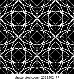Seamless abstract pattern. Imitation lace. White lace on black background. Black and white graphics. For design and decoration of fabric, paper, Wallpaper and packaging.Mesh pattern.